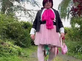 Dressed in a pink polka dot skirt for a party