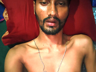 Lying in bed masturbating