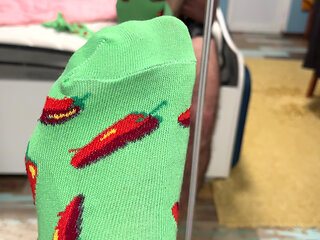 Playful Green Socks with Red Pepper Pattern pres. by Earl Smile