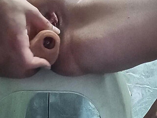 Masturbating