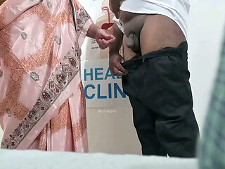 Lady Doctor checking patients black cock