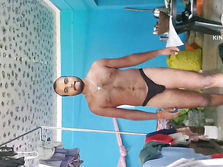 Indian boy is sweeping the house naked