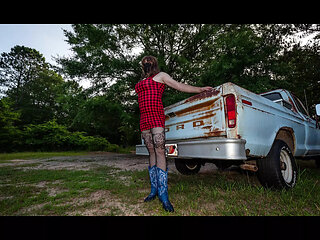 Jon Scarecrow Big Fake tits Crossdresser in Snug Plaid Dress and Cow Girl Boots Outside