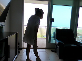 Sunning on the balcony in plain view of everyone walking by
