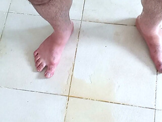 I pee on the bathroom floor, then sat on my pee and began masturbating