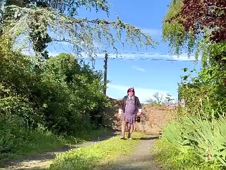 Dressed in a little purple polka dot dress