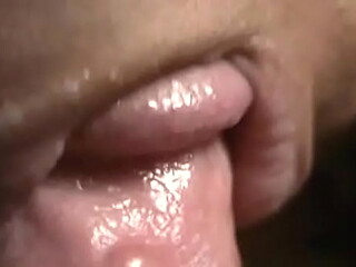 Ebony temptress sucks cock and makes him spill his load