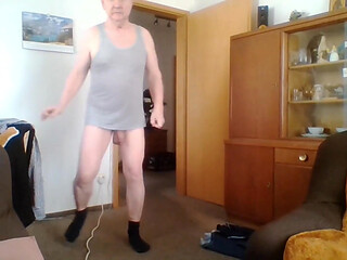 Andreas with suspender belt and bra jerking off