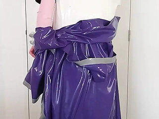 Undressing latex layers, rubber robe coat, schoolgirl sailor uniform, long skirt, stockings, transparent panties