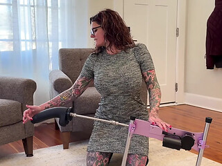 Inked MILF enjoys hardcore fuck machine action