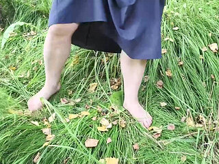 Sexy milf pees in the forest