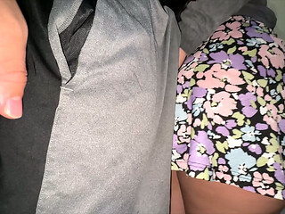 Big-assed girl in a skirt strokes a stranger'_s penis.