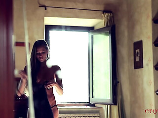 Sensual blonde Sylvie Deluxe shows off her gorgeous body in a full-on