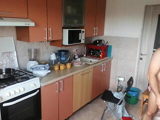 Crazy couple having fun in the kitchen.