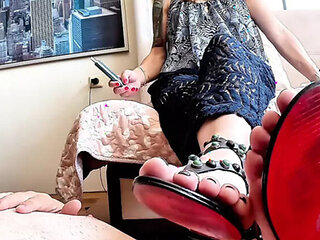 Mistress YammyBoots Dominates Slave with Footjob & Humiliation