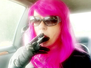 Mrs. Roman TG with Pink Hair and leather gloves smoking VS120s Menthol driving CD mature ladyboy smoking fetush
