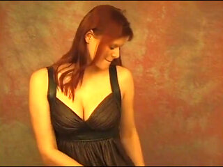 On her phone and showing boobs