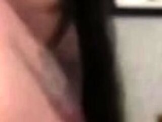 Amateur young brunette enjoys dildo on solo masturbation