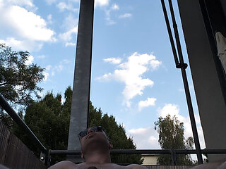 Wixxing on the balcony
