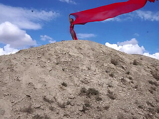 On Top of Hill with Red Flag