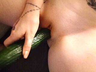 Playful private erotic adventure with a cucumber in front of the camera