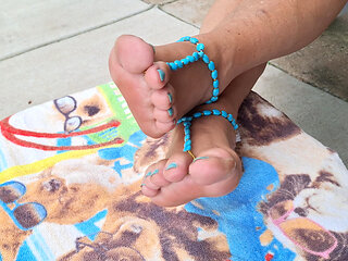 Showing off her cute barefoot sandals on her cute bare feet