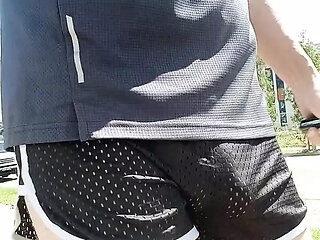 Free balling in mesh shorts so small my big cock keeps falling out