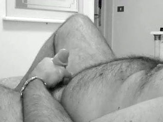 Wanking and cumming in black and white