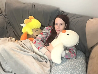 girl takes cares of mans feet after work. she takes off his boots and socks and smells them deeply