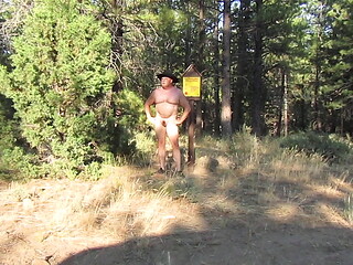 Naked at the campfire sign.
