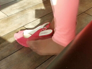 Shoeplay with High Heels in a Bar