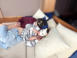On the Sofa in Their Secret Room, They Shared Passionate Kisses Before Making Love, Expressing Their Deep Love.