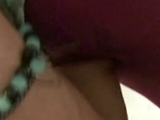 Grey nylon mask and pink pantyhose legs