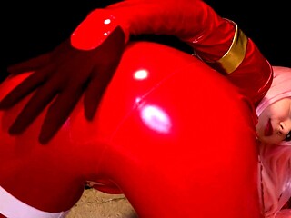 Femdom MILF vixen in red latex bodysuit plays with herself