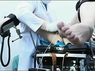 Doctor administers a hardcore gyno exam