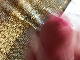 Jerking off my big fat cock until I cum a lot in the foreground