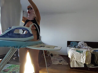 Amateur mom does housework naked.
