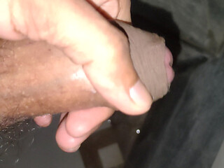 Man masturbating in bathroom