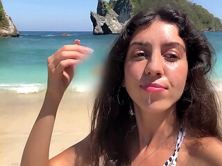 Hottie sucks my dick on a public beach and walks along the shore with cum on her face - Cumwalk