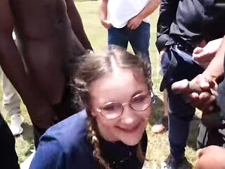 Bukkake Orgy: 44-Year-Old Wife in Pigtails Slurps 25 Cocks as