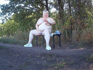 Mother-in-law in the Park Undresses and Masturbates to Orgasm on a Bench