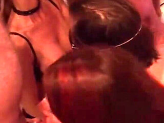 Horny milfs in sexy lingeries are getting fucked at the orgy