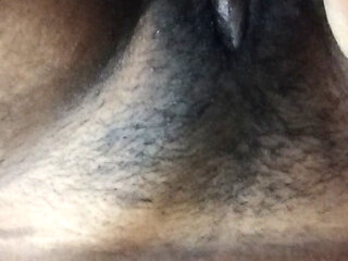 Busty bitch playing with herself and fucking herself with a cucumber