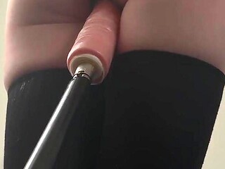 Fox-like teen rides massive cock in a fuck machine