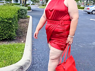 Beautiful Woman Walking Outdoors in  Parking Lot Showing off for Strangers