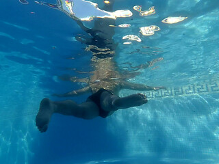 Swimming in the pool naked