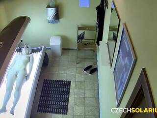 Czech Solarium 323: Blonde Puts on a Flirty Solarium Show