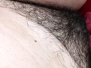 Amateur wife fingers her pussy until she reaches orgasm. Latina hairy pussy, big ass, big tits. Horny MILF