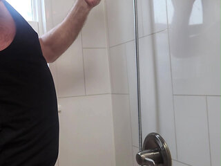 Handsome hairy daddy installs a new shower head, gets soapy, wet and cums!
