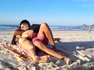 Caught Couple on the Beach